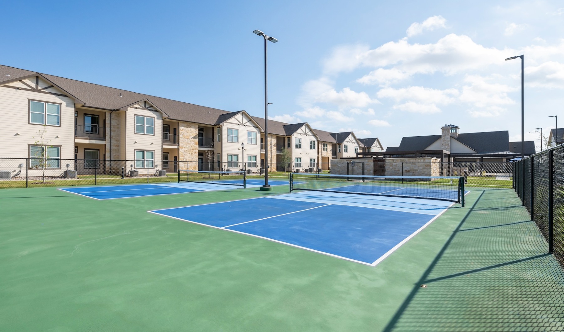 Play Pickleball and More! Pickleball Courts at Senior Living Apartment Complex